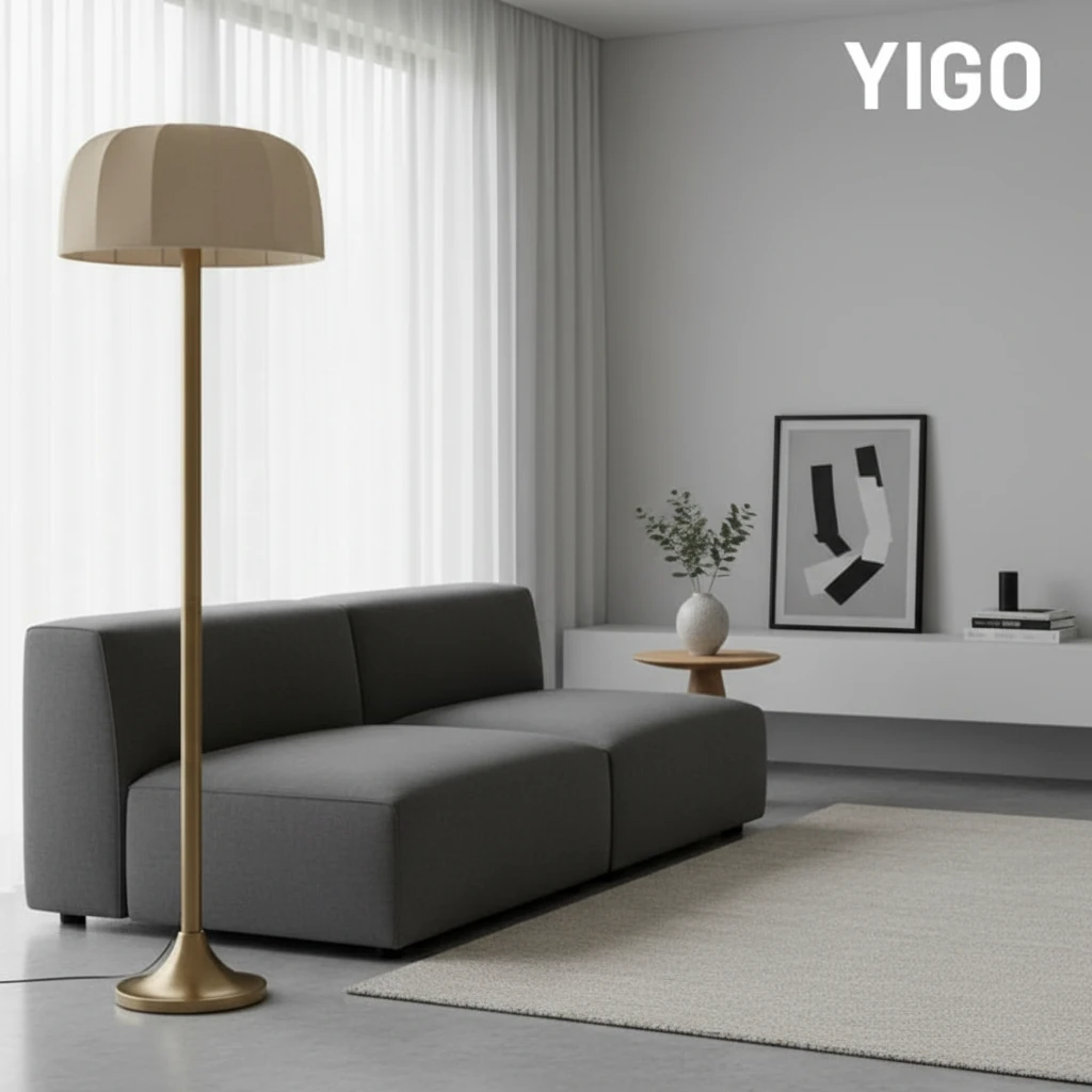 Calmo floor lamp beside a modern grey sofa in a bright living room